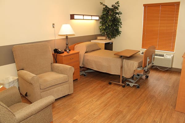 Private resident room with furniture and window