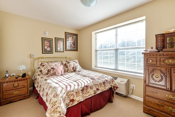 Cozy private bedroom in a senior living facility