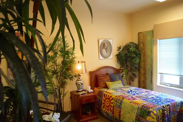 Bright interior of a resident's room with colorful decor