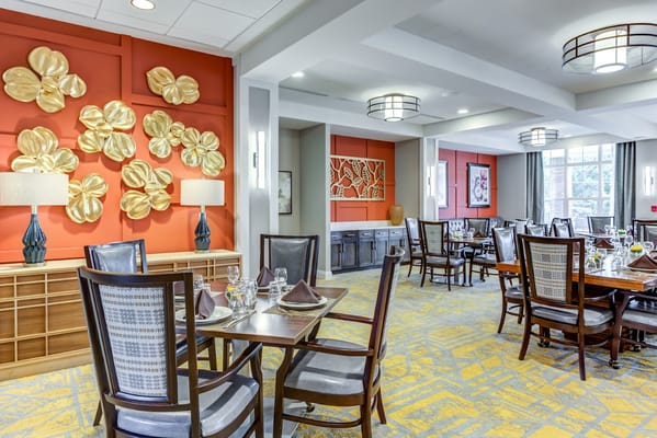 Elegant dining area with decorative lighting and floral accents
