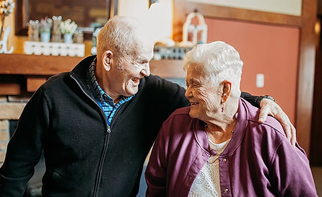 Residents enjoying a candid moment together in a common area
