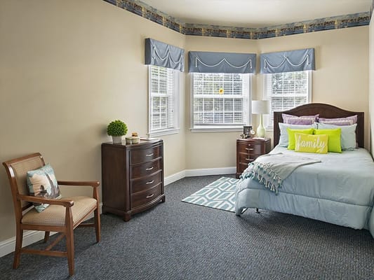 Comfortable resident room with light decor