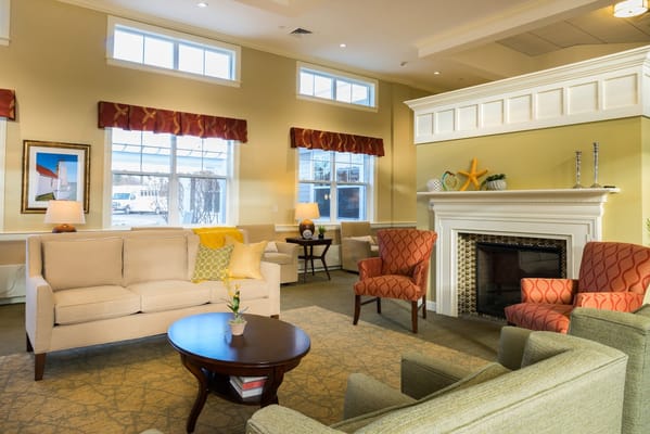 Cozy common area with seating and fireplace