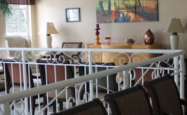 Interior common area with comfortable seating and lamps