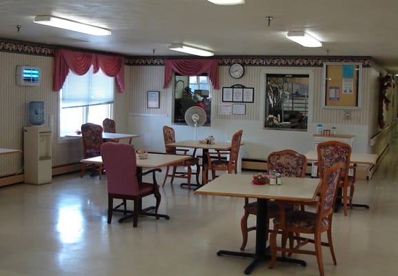 Dining area with chairs and tables in a facility