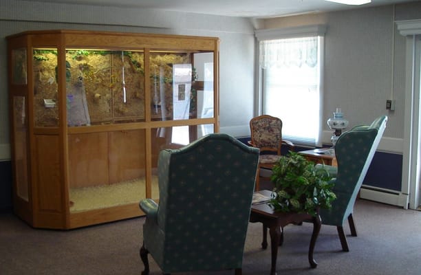 Interior common area with seating and display case