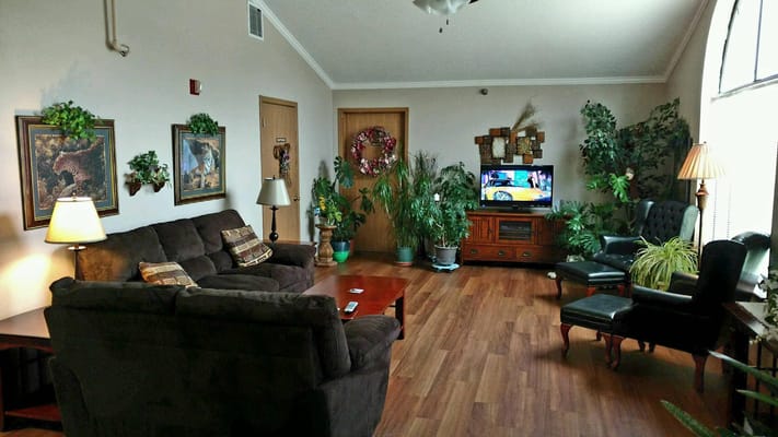 Cozy common area with plants and seating