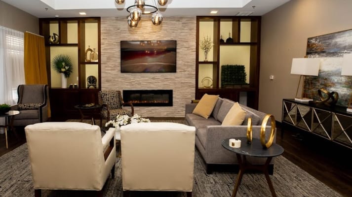 A beautifully designed common area with seating and decor
