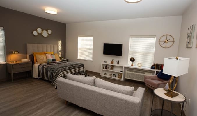 Cozy resident room with modern decor and furnishings