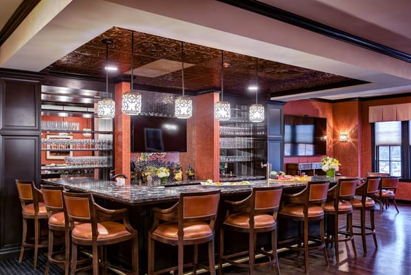 Interior view of a bar area with seating and food