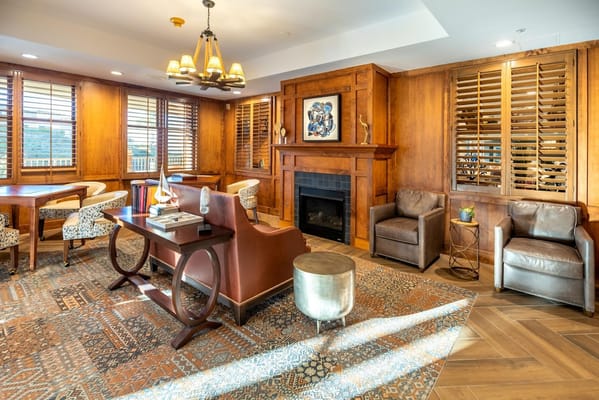 Cozy common area with comfortable seating and a fireplace