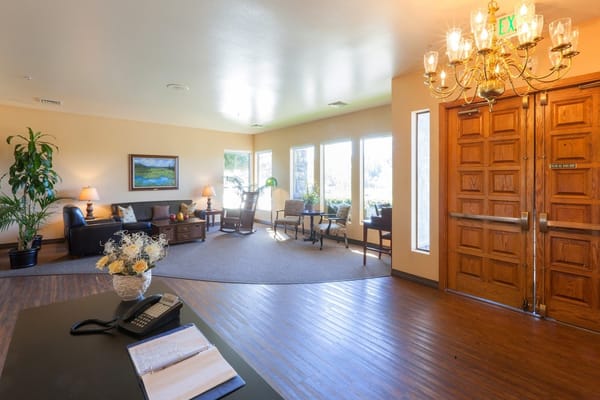 Bright and welcoming lobby area with seating and decor