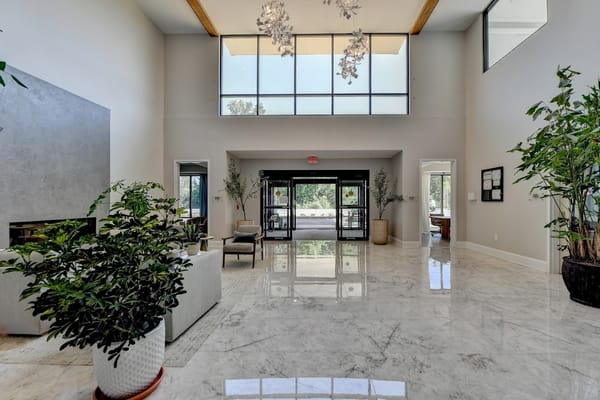 Bright, spacious lobby with modern decor and furniture