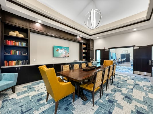 Interior view of a common area with a dining table