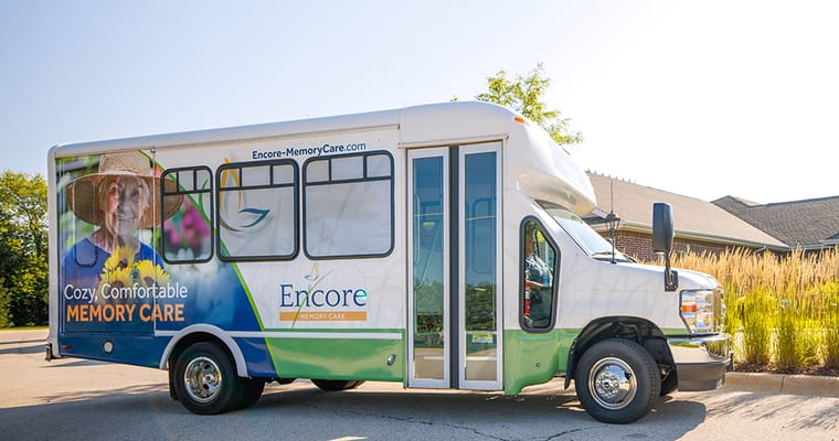 Facility shuttle bus with branding
