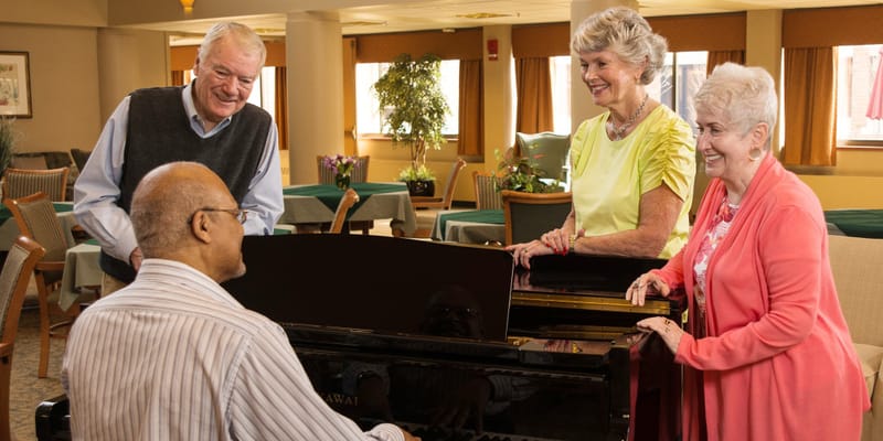 Residents enjoying music together in a communal space