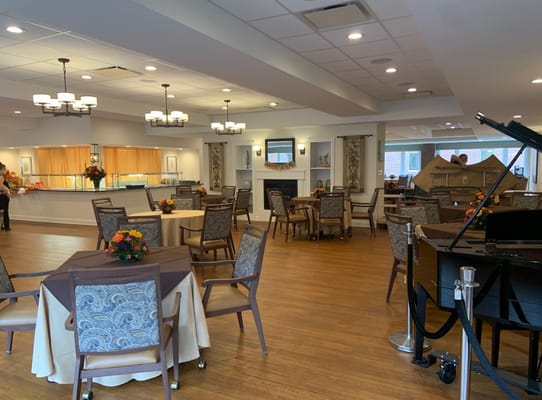 Indoor dining area with tables and chairs set up