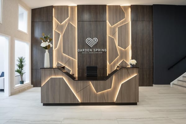 Stylish reception area with modern decor and logo