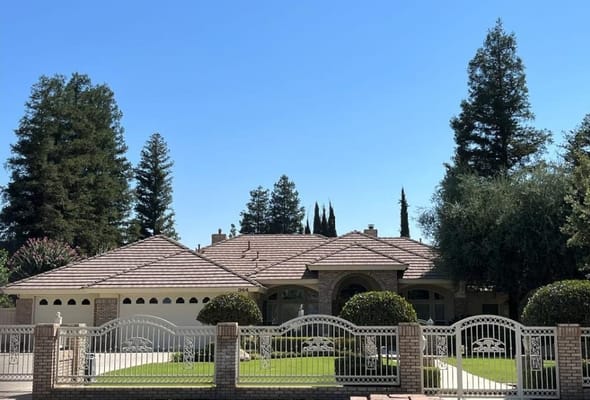 Front view of Garnsey Garden with landscaped yard and trees