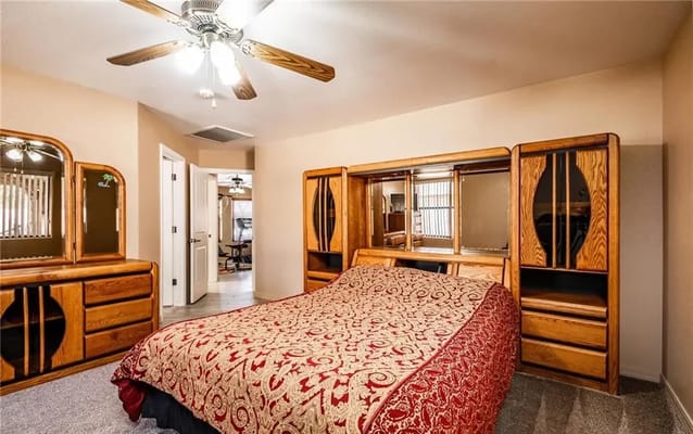 Interior view of a private resident room with furniture