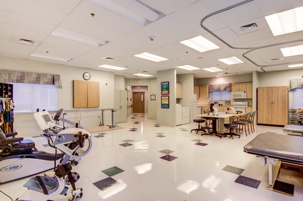 Interior rehabilitation room with therapy equipment