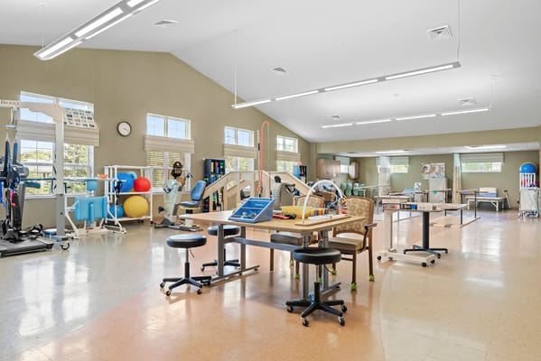 Rehabilitation activity room with therapy equipment