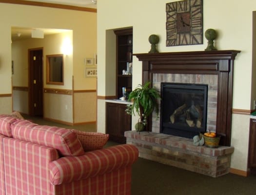 Cozy common area with a fireplace and seating