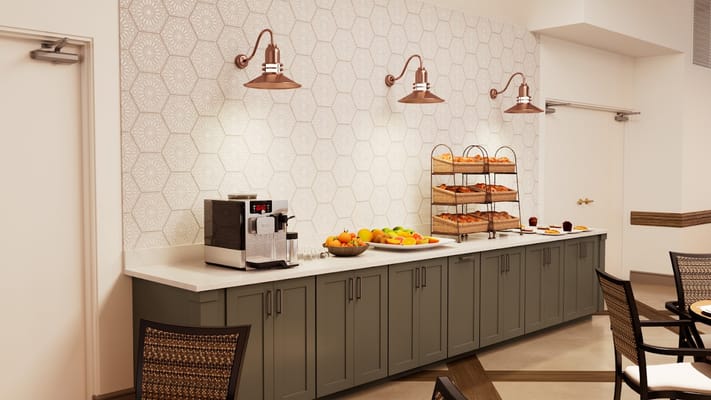 A dining area with food and coffee service