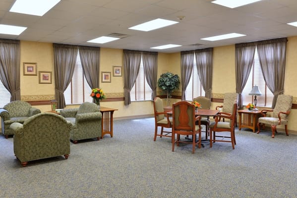 Cozy common area with seating and natural light at The Laurels of Massillon