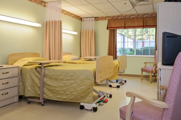 Interior view of a shared resident room with beds