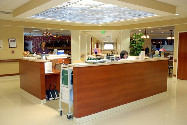 Reception area with staff members assisting