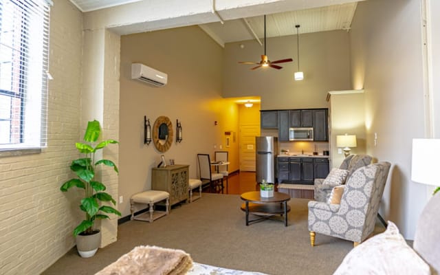 Cozy interior of a resident's room with kitchen area