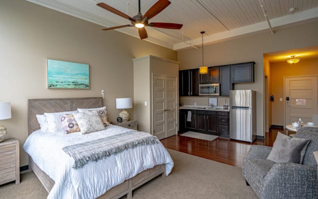 Well-decorated private resident room with kitchenette