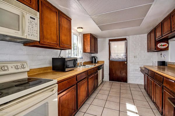 Spacious and well-lit kitchen in a residential setting