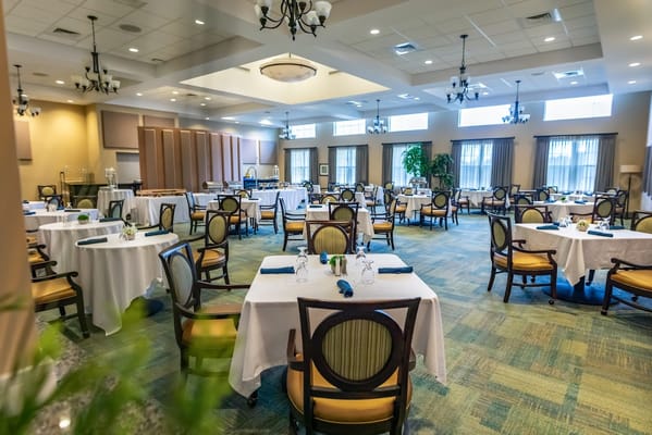 Well-furnished dining room with neatly arranged tables