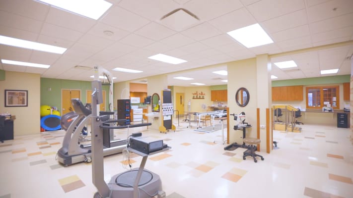 Interior view of a therapy room with equipment