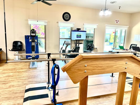 Interior view of the therapy room with exercise equipment at Mountain Manor