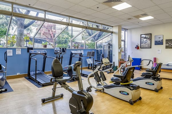 Interior view of an exercise room with equipment