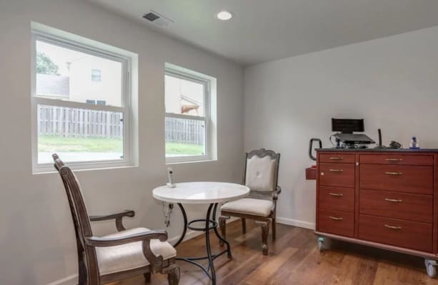 A well-furnished common area with natural light