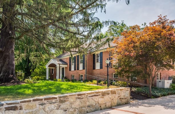 Exterior view of the assisted living facility with landscaping