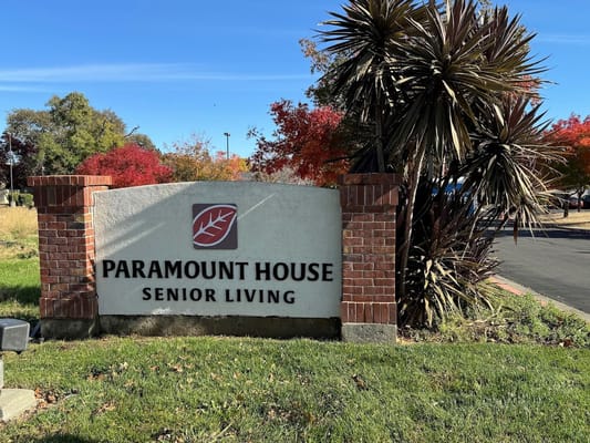 Sign for Paramount House Senior Living at the entrance