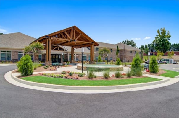 Welcoming entrance of Prema at Suwanee Creek with outdoor landscaping