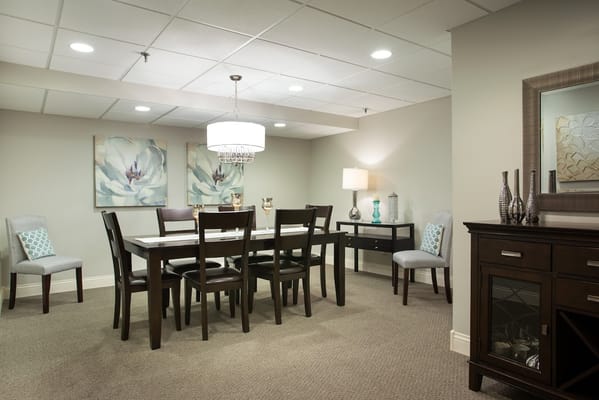 Elegant dining area with a long table and stylish decor