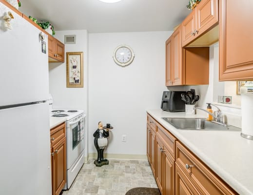 Cozy kitchen with modern appliances and decorative accents.