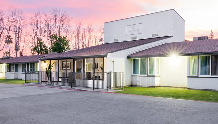 Front entrance of San Joaquin Nursing and Rehabilitation Center at sunset