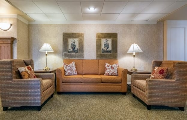 Cozy common area with seating and lamps