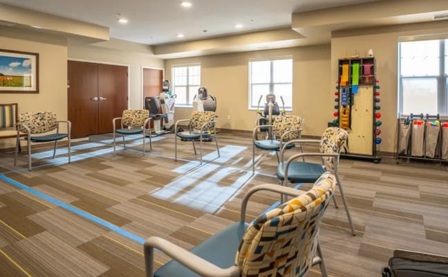 Bright interior exercise room with equipment