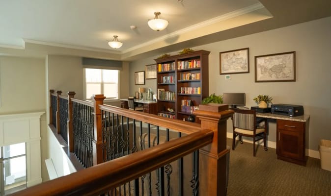 Common area with bookshelves and seating