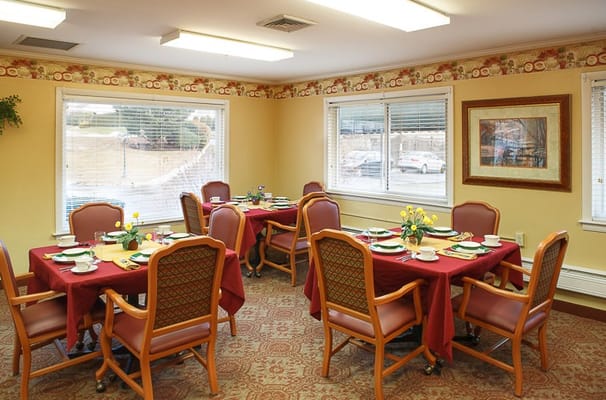 Dining area with tables set for a meal