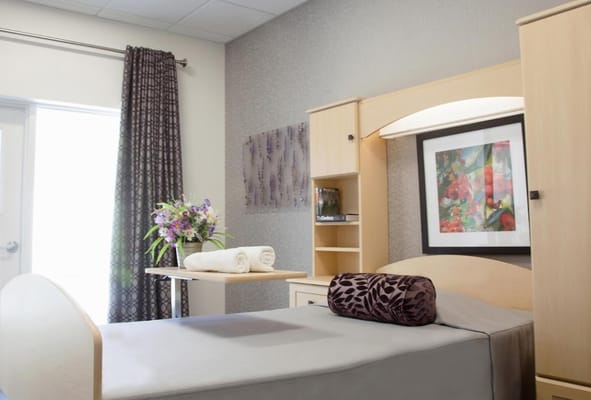 A well-decorated private resident room with floral decor